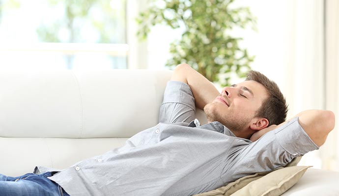 Person enjoying fresh indoor air