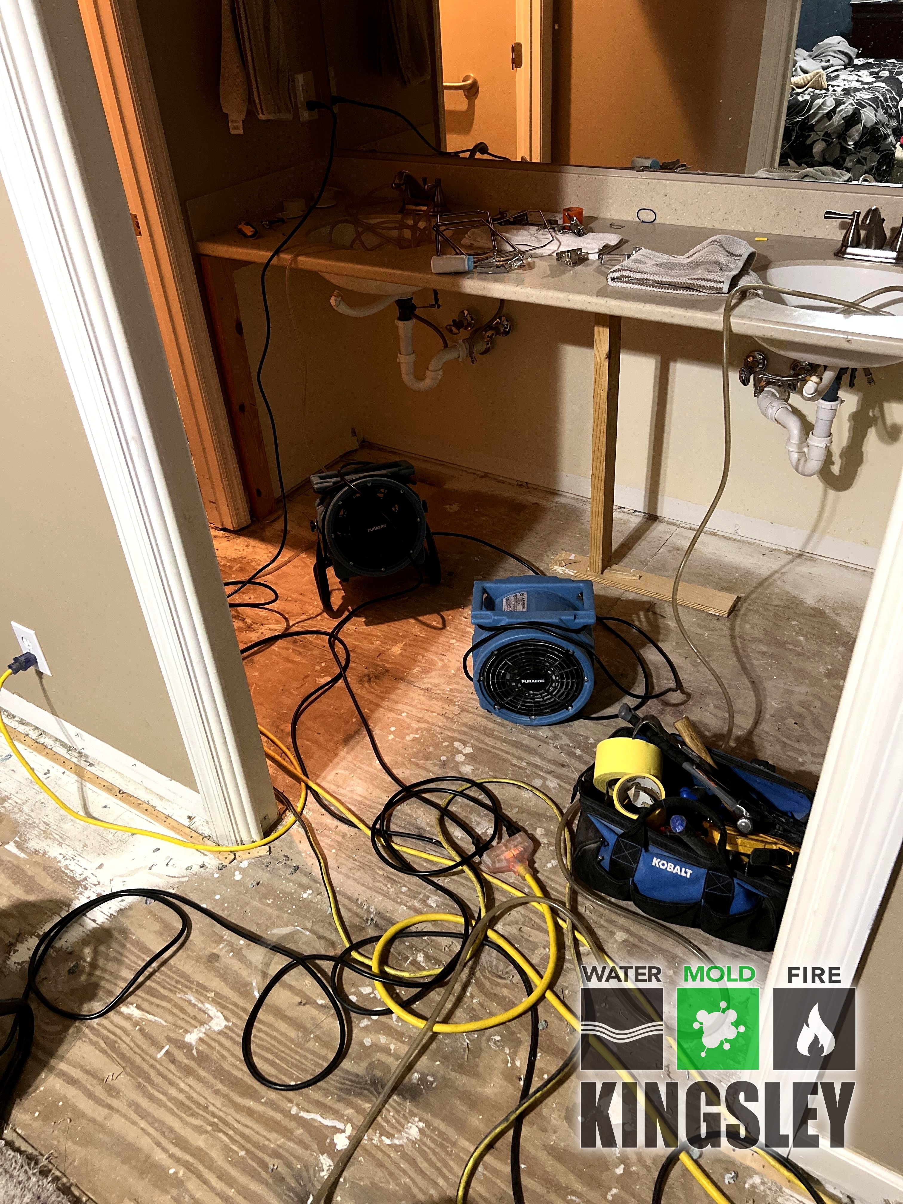 Bathroom water mitigation with vanity demo and air movers in Chapin, SC