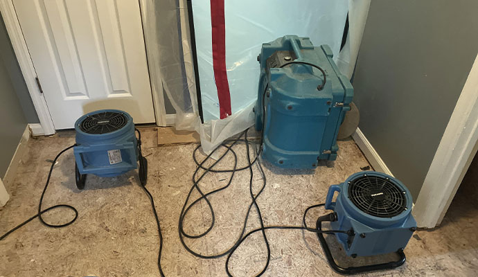 Water extraction equipment in flooded room