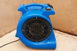 Industrial fan to remove water damage